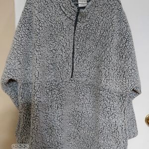 Gray and white warm sweater.